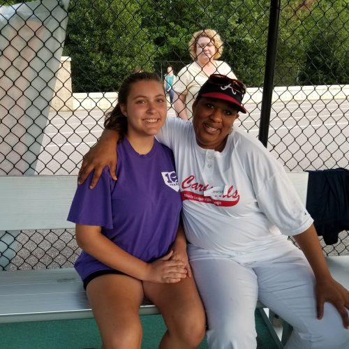 Buddy and player on bench